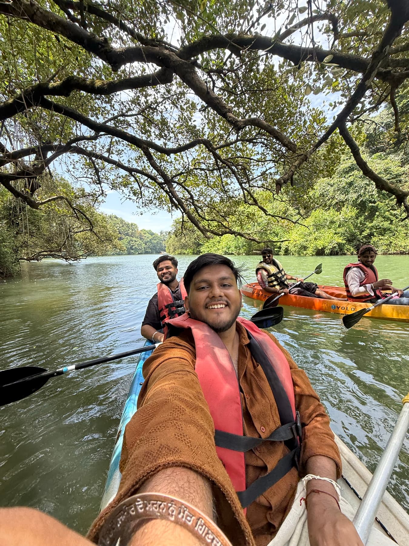 The crew kayaking through the backwaters